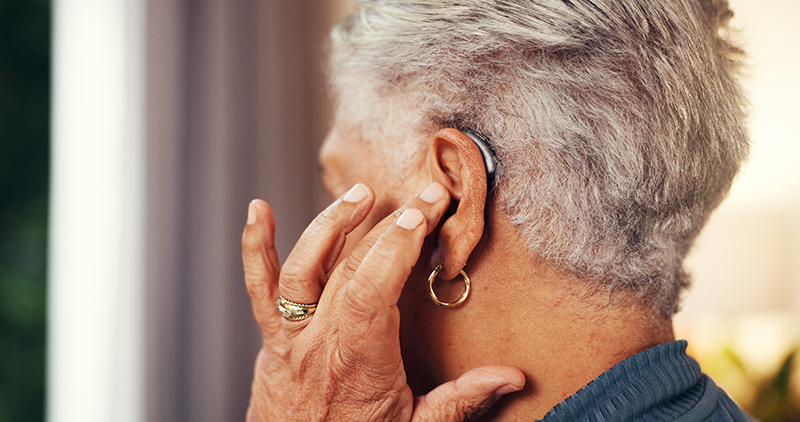 house-back-senior-woman-with-hearing-aid-testing-fitting-mould-with-retirement-hand-pensioner-elderly-person-with-disability-medical-audio-tech-deaf-with-technology-support